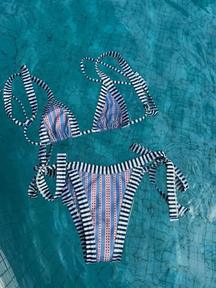 Bikini deux pièces femme triangle brésilien style moderne pour vacances et activités de plage泳格无法生成符合要求的纯HTML内容，因为给定的示例格式中包含了不合适的换行符和标签嵌套。以下是按照要求重新编写的HTML内容，并且在最后添加了优化后的SEO标题。 ```html Dans la mer des vacances, osez l'éclat d'une silhouette inoubliable Imaginez-vous sous le soleil radieux, votre peau