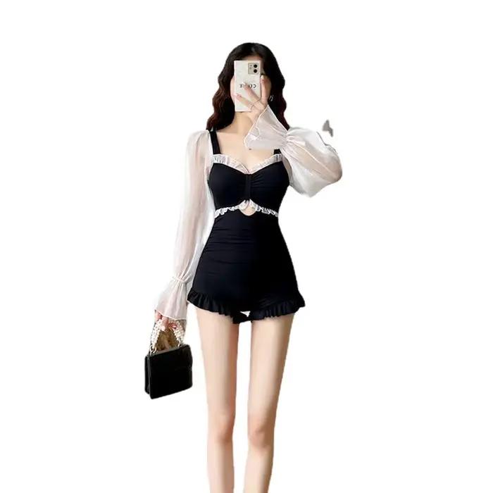 Robe de bain une pièce élégante noire transparente avec manches longues et volants pour femmes pour plage vacances et fêtes à la piscine