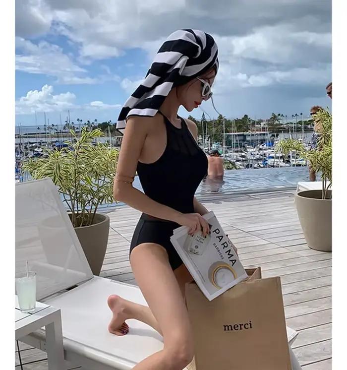 Maillot de bain femme vintage une pièce noir solide col suspendu pour nage et plage occassions spéciales