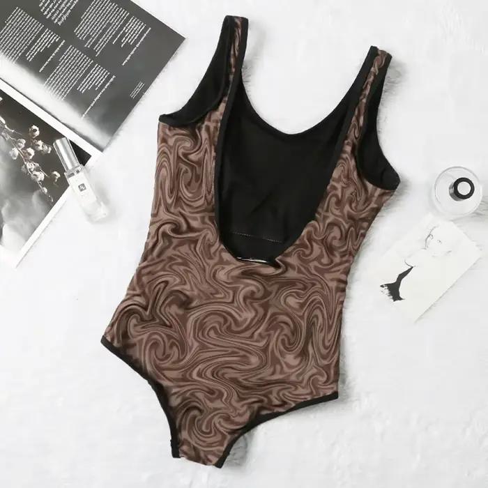 Maillot de bain une pièce amincissant pour femme avec design cache-ventre